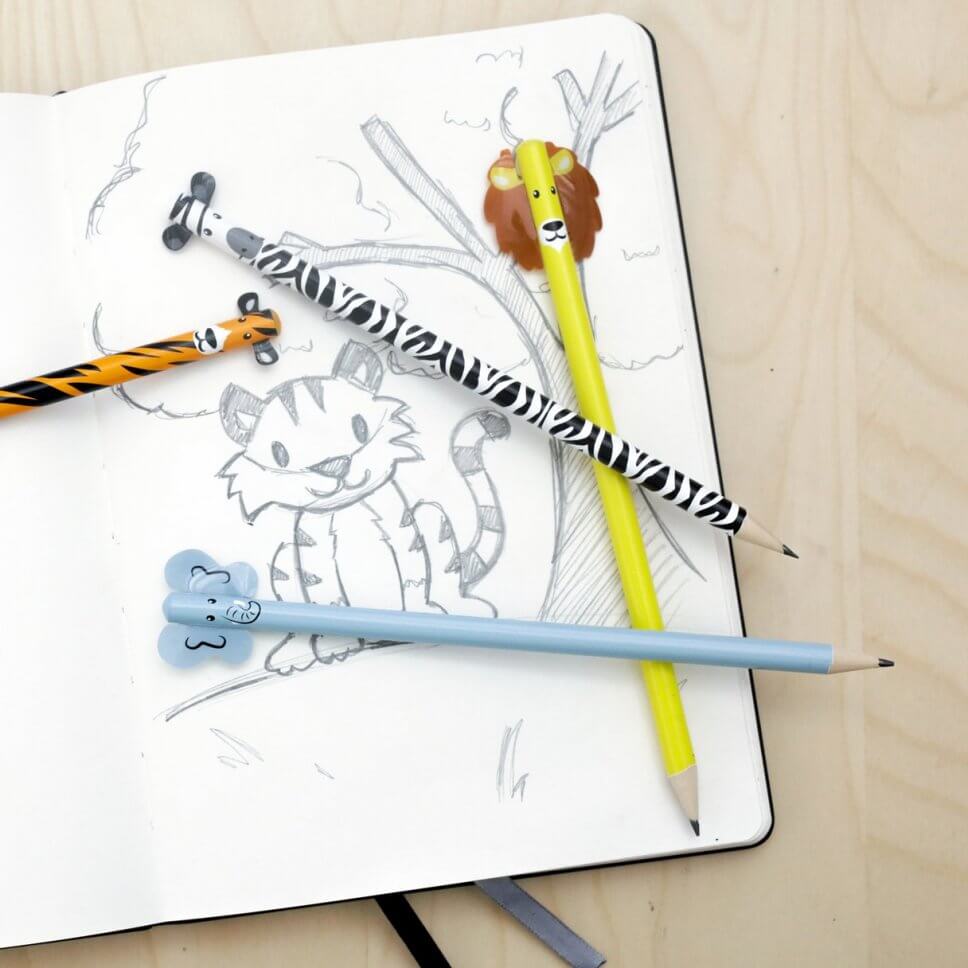 Bunte Notizhefte und Stifte