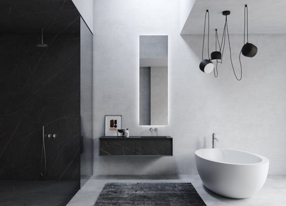 Modern eingerichtetes Badezimmer mit Badmöbel in Schwarz