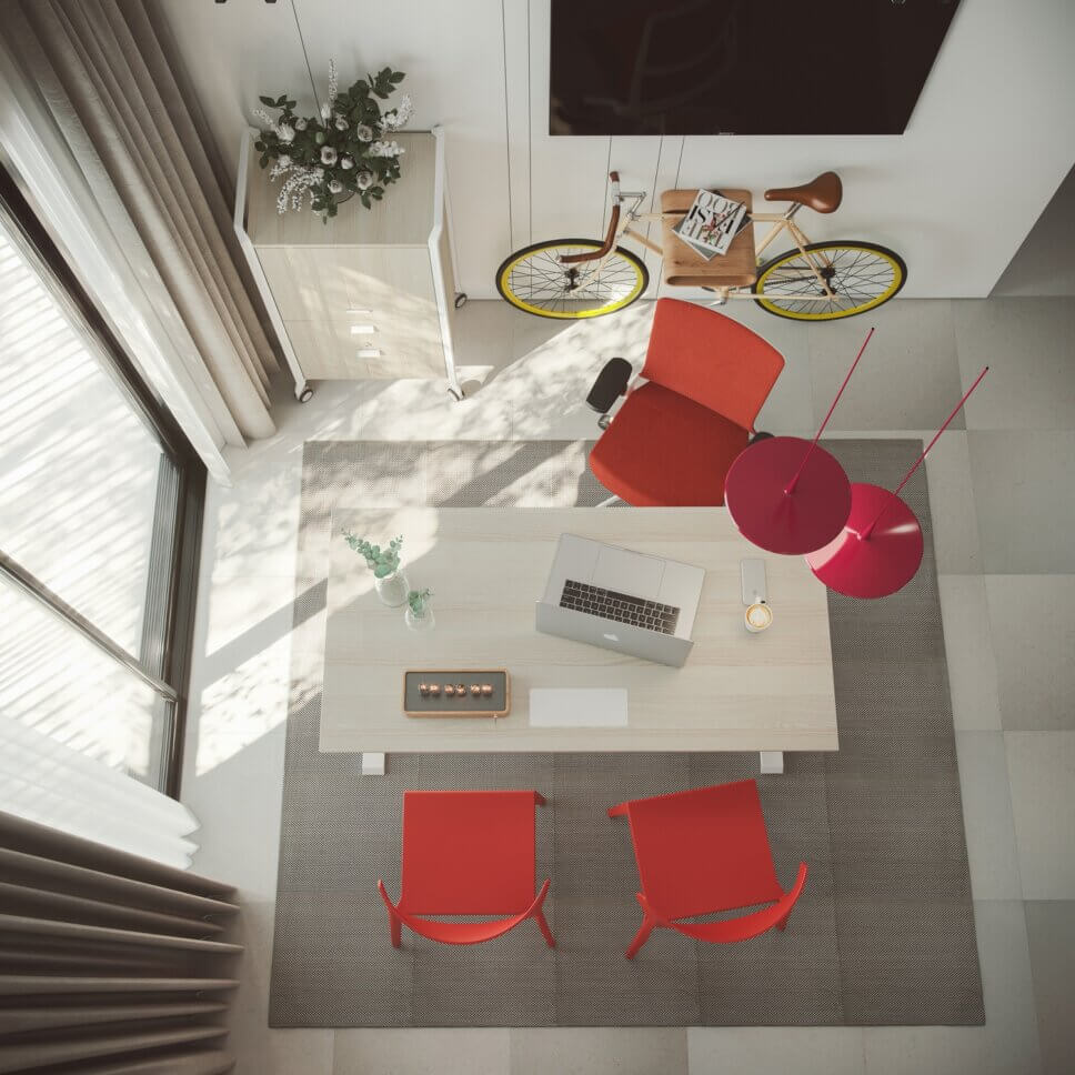 Modern eingerichtetes Home-Office mit Schreibtisch und Stuhl