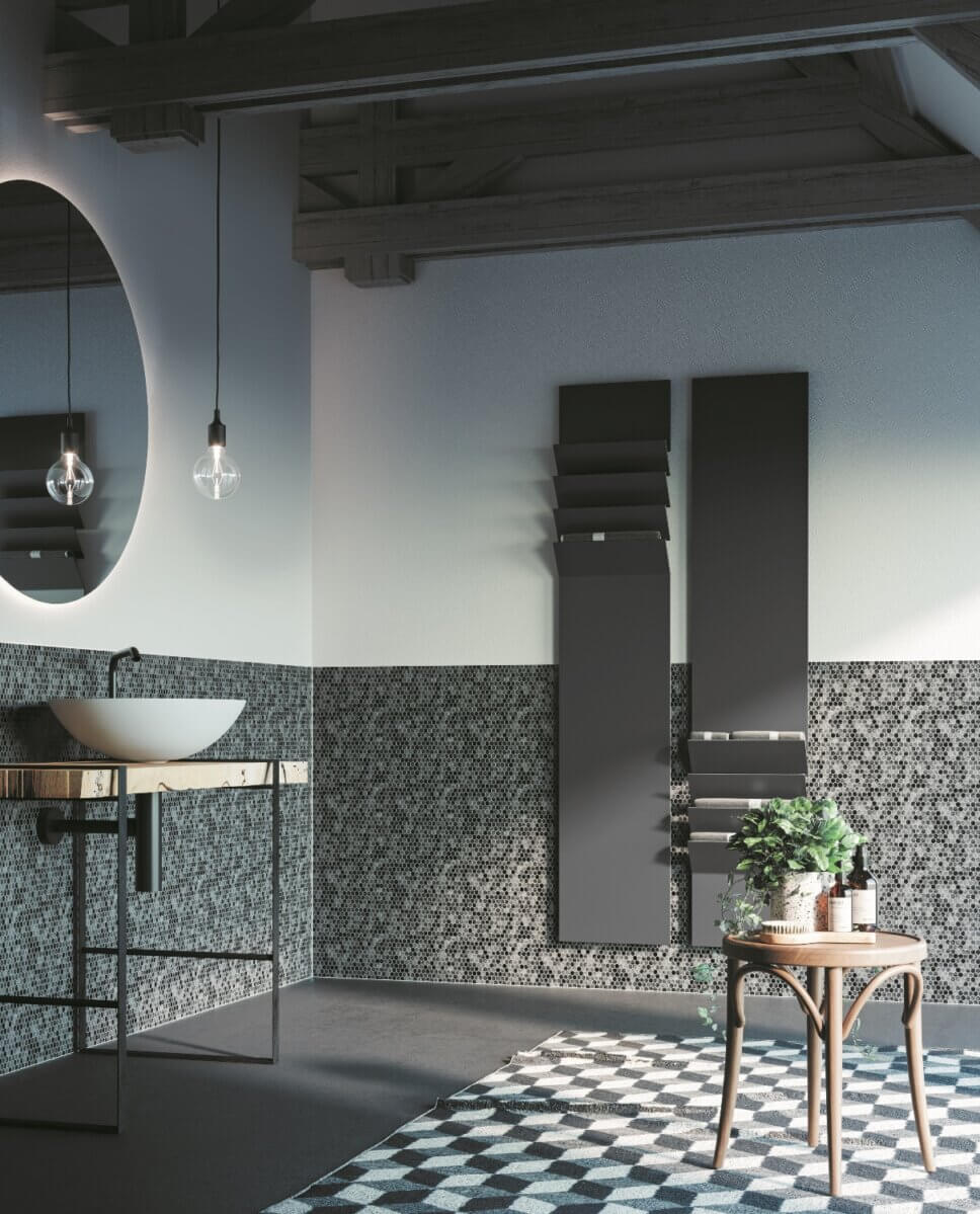 Modern eingerichtetes Badezimmer mit formschön gestaltetem Heizkörper