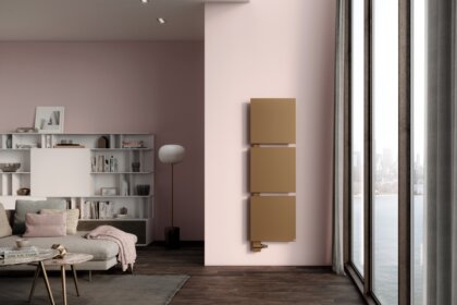 Modern eingerichtetes Wohnzimmer mit formschön gestaltetem Heizkörper