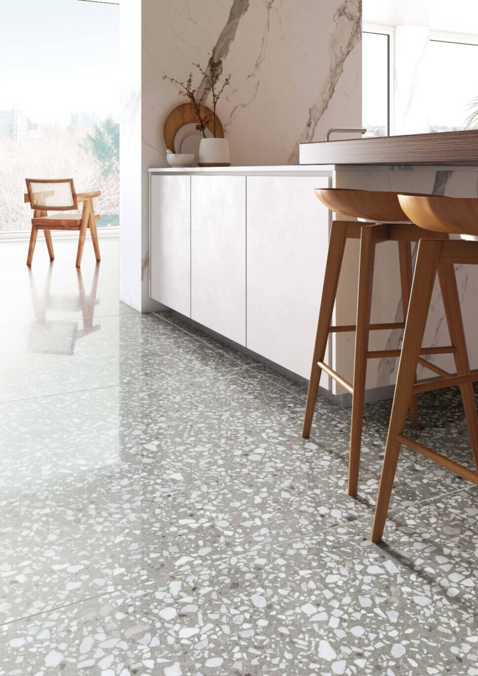Modern eingerichtete Küche mit Fliesenboden in Terrazzo-Optik