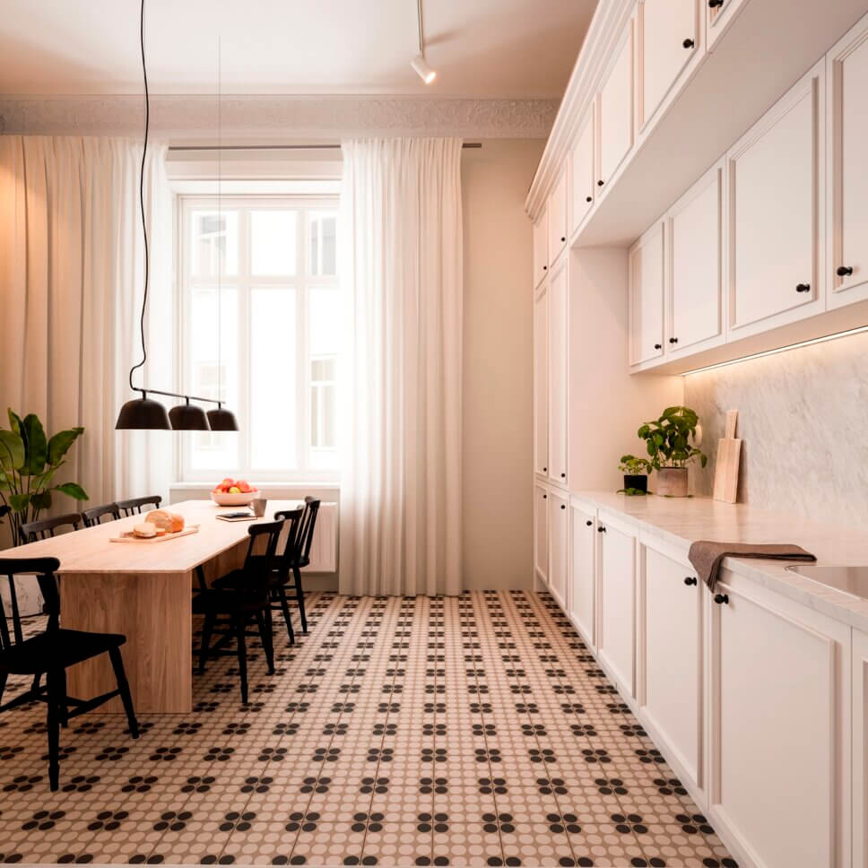 Modern eingerichtete Küche mit gemusterten Zementfliesen